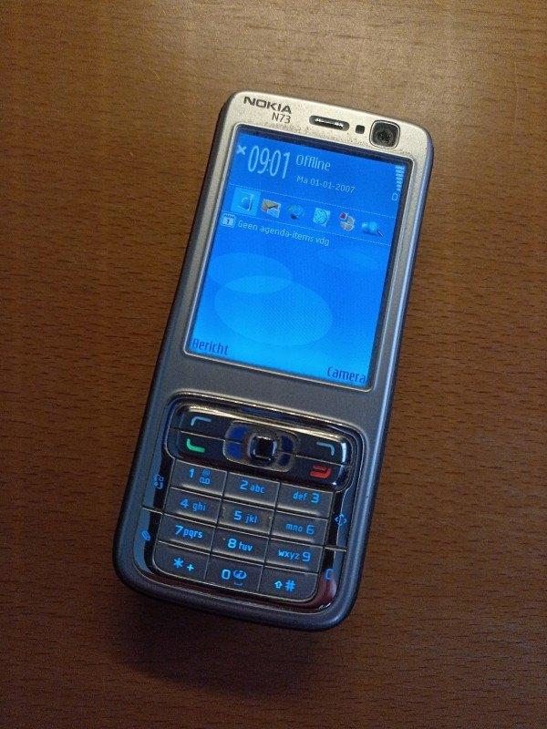 Zilverkleurige Nokia N73 Candybar phone; incl lader, Verzenden, Fysiek toetsenbord, 3 tot 6 megapixel, Zo goed als nieuw