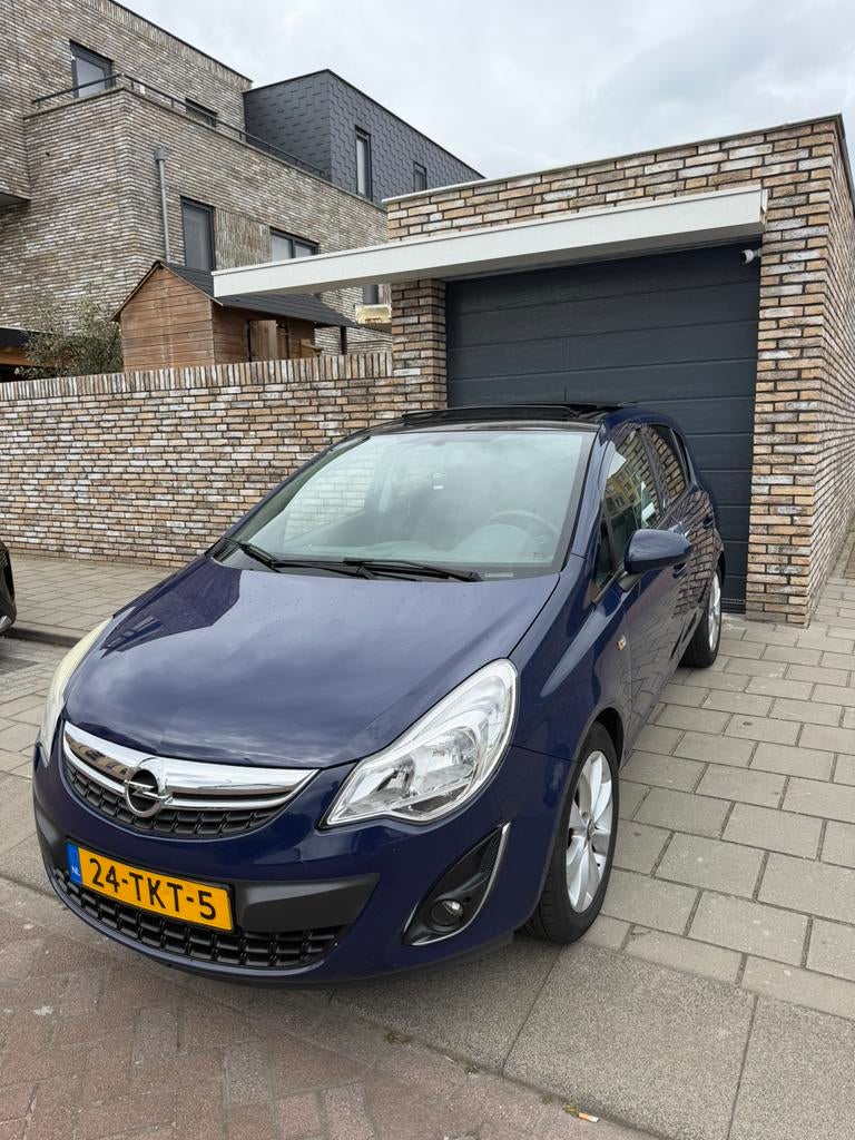Opel Corsa 1.4 5D AUTOMAAT 2012|Airco|Apk|Panoramadak|Cruise, Parkeersensor, 4 cilinders, Blauw, 100 pk