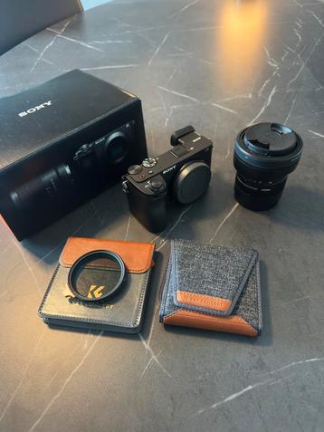 Sony a6700 met Sigma 18-50 , 1075 clicks beschikbaar voor biedingen