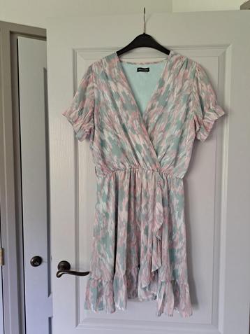 Leuke roze met mintgroene jurk van Papillonne, maat M.  beschikbaar voor biedingen
