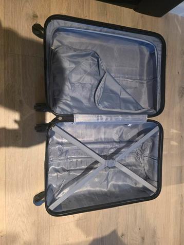 Zwarte Reiskoffer met Wieltjes beschikbaar voor biedingen
