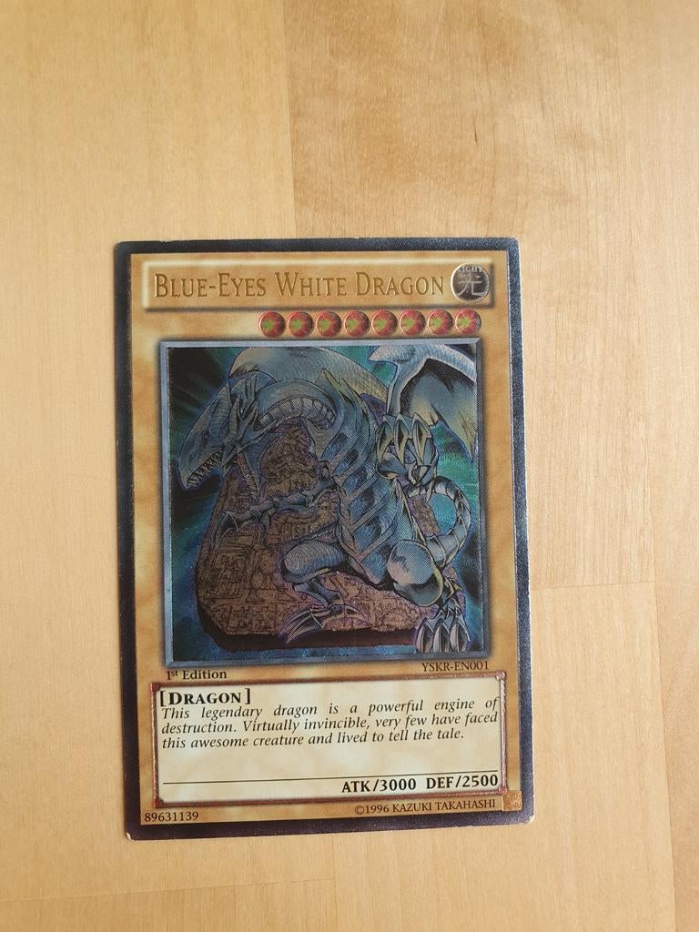 Blue-Eyes White Dragon Ultimate Rare 1st Edition YSKR-EN001, Hobby en Vrije tijd, Verzamelkaartspellen | Yu-gi-Oh!, Ophalen of Verzenden