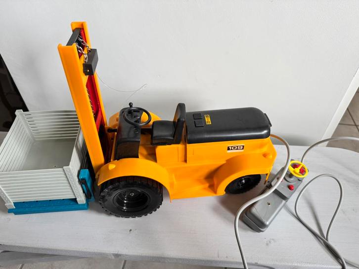 Vintage kunststof heftruck Clark Fino originele doos, Antiek en Kunst, Antiek | Speelgoed, Ophalen of Verzenden