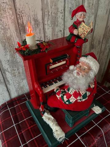 Holliday Creations Bewegende kerstman speelt de piano beschikbaar voor biedingen