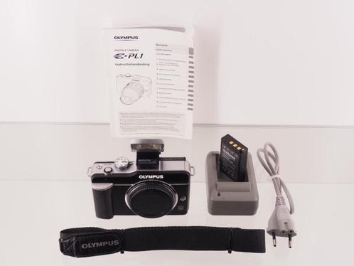 Olympus E-PL1 body + FL-LM1 flitser, Verzamelen, Fotografica en Filmapparatuur, Fototoestel, Ophalen of Verzenden