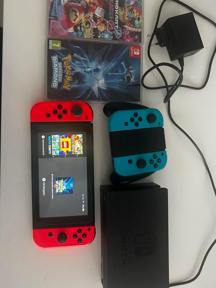 Nintendo Switch met Games + Extra Controller, Spelcomputers en Games, Games | Nintendo Switch, Gebruikt, Racen en Vliegen, 2 spelers