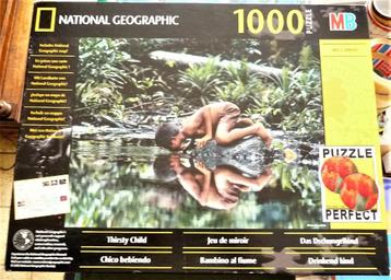 2 NAT. GEOGRAPHIC PUZZELS 1000 ST DE TEMPEL EN DRINKEND KIND beschikbaar voor biedingen