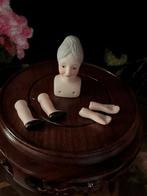 Porseleinen hoofdje met armen en beentjes van porselein., Verzamelen, Ophalen of Verzenden, Zo goed als nieuw