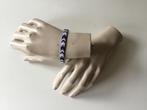 Armband van Michaela Frey ( in Hilversum ), Sieraden, Tassen en Uiterlijk, Armbanden, Ophalen of Verzenden, Gebruikt, Paars, Staal