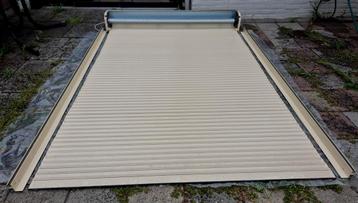 Rolluik met afstandsbediening  beschikbaar voor biedingen