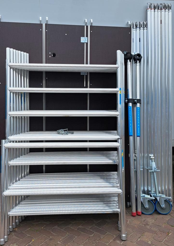 Te koop nieuwe 12 mtr werkhoogte rolsteiger met 8 wielen, Doe-het-zelf en Verbouw, Steigers, Rolsteiger of Kamersteiger, 5 meter of hoger