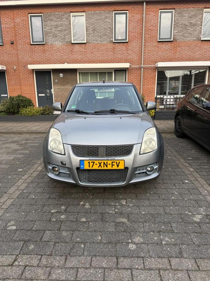 Suzuki Swift 1.3 3D 2007 Grijs (76000 KM), Auto's, Suzuki, Particulier, Swift, Airbags, Bluetooth, Centrale vergrendeling, Elektrische ramen
