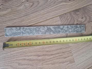 	 Zilveren liniaal met stempels uit China beschikbaar voor biedingen