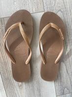 Havaianas Slippers Goud Glitter - 39/40, Kleding | Dames, Schoenen, Ophalen of Verzenden, Gedragen, Beige, Slippers