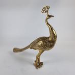 &Klevering Pauw goudkleurig, Ophalen