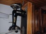 Antieke pfaff naaimachine, Ophalen