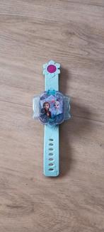 Vtech Frozen spelletjes Horloge 
Het Horloge is zeer goede s, Ophalen of Verzenden, Zo goed als nieuw
