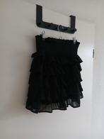 Prachtig glitter rokje met ruffles van NIKKIE. Maat 38., Maat 38/40 (M), Verzenden, Zwart, Nieuw