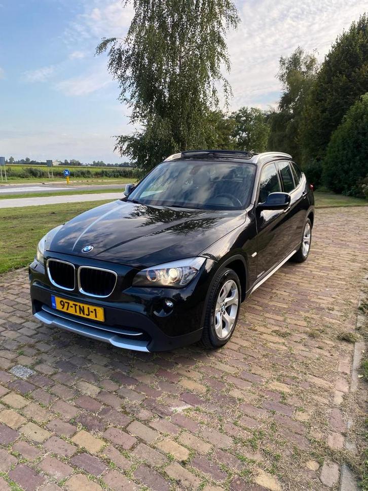 BMW X1 Sdrive 20D AUT 2012 Zwart PANO/HEMEL/TREKHAAK, Auto's, BMW, Particulier, X1, ABS, Achteruitrijcamera, Adaptieve lichten