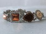 armband met edelstenen nieuw, Overige materialen, Bruin, Ophalen of Verzenden, Zo goed als nieuw