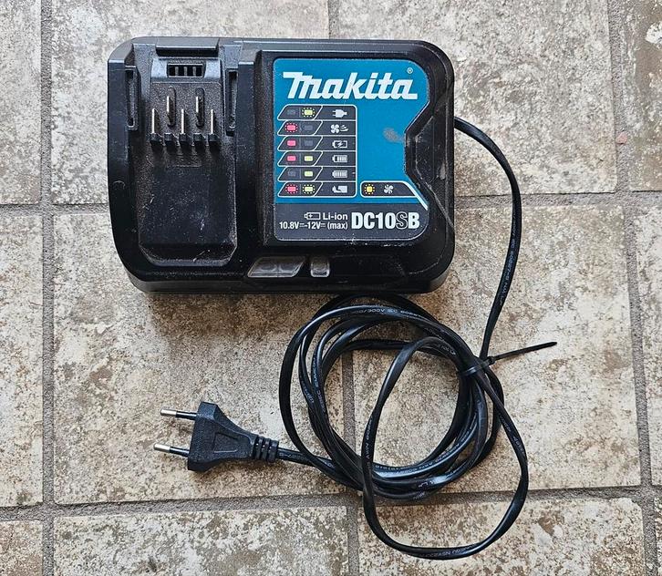 Makita DC10SB acculader 10.8V – 12V Li-Ion, Doe-het-zelf en Verbouw, Gereedschap | Machine-onderdelen en Toebehoren, Gebruikt