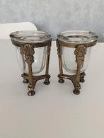 Twee metalen houders met dik glazen vaasje. Waxinehouder, Huis en Inrichting, Woonaccessoires | Kandelaars en Kaarsen, Ophalen of Verzenden