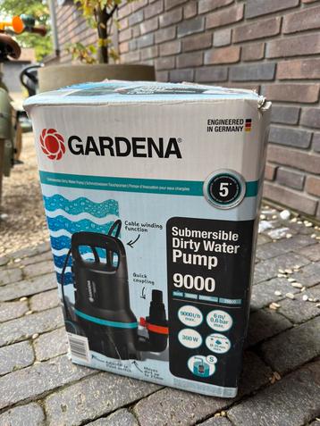 Dompelpomp Gardena 9000 met slang/koppeling beschikbaar voor biedingen