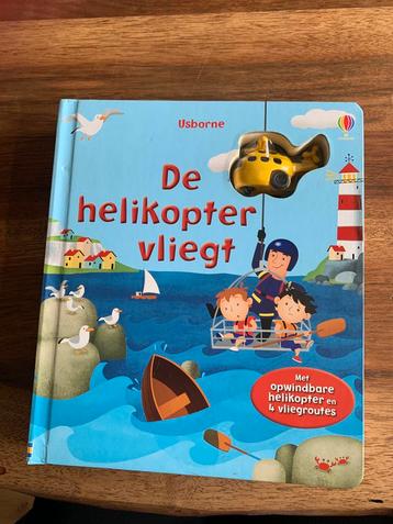 Prachtig boek met een rijdende helikopter.  beschikbaar voor biedingen