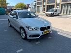 BMW 1-Serie 118i 136pk Aut 2017 Wit, Auto's, BMW, 65 €/maand, 1295 kg, Wit, 650 kg
