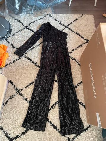Jumpsuit met glitters beschikbaar voor biedingen