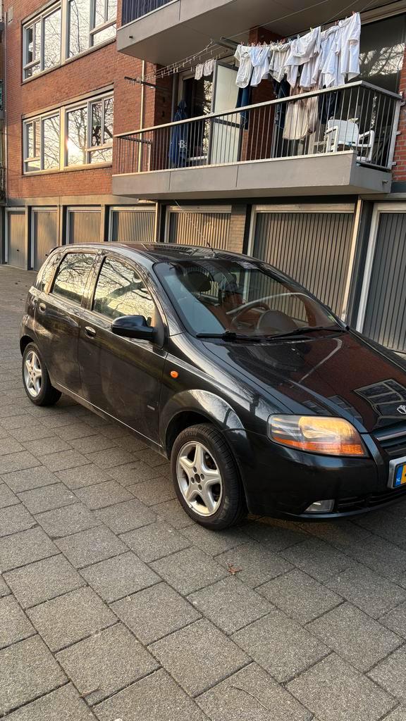Daewoo Kalos 1.4 16V AUT 2003 Zwart, Auto's, Daewoo, Particulier, Kalos, Benzine, D, Hatchback, Automaat, Origineel Nederlands