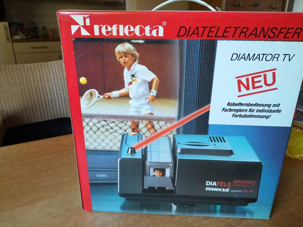 Dia's op TV met deze Reflecta, Ophalen of Verzenden, Zo goed als nieuw