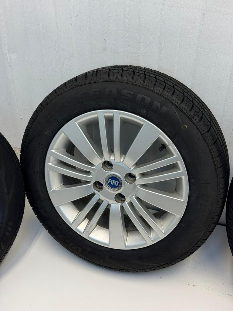 Org. Fiat Grande Punto velgen met All-Seasons175/65R15 4x100, Auto-onderdelen, Banden en Velgen, Gebruikt, 15 inch, 175 mm, Banden en Velgen