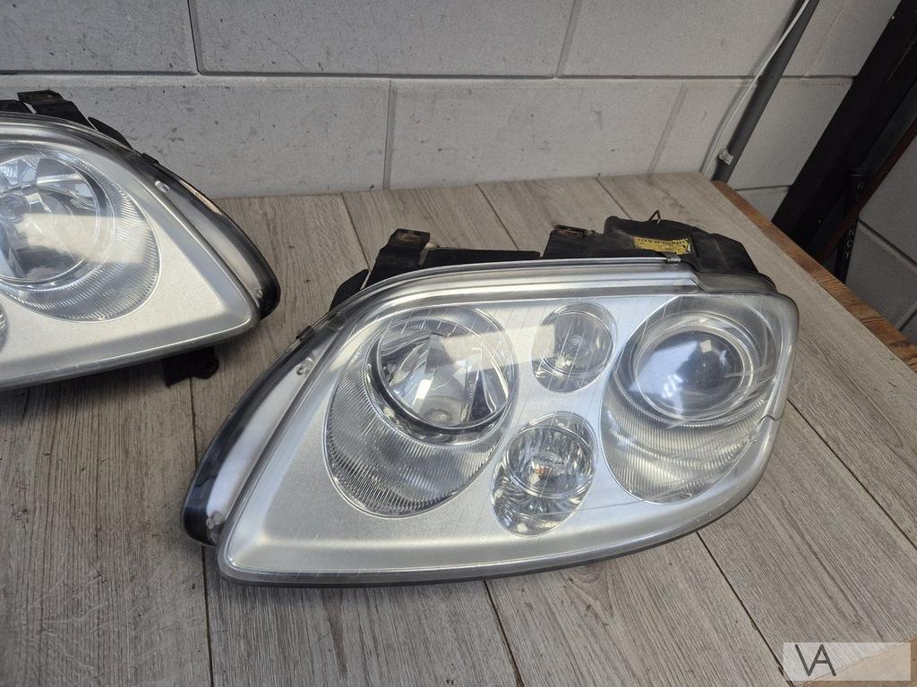 VW Touran 03-07 en Caddy 03-10 koplamp links xenon €100, Gebruikt, -, Volkswagen, -