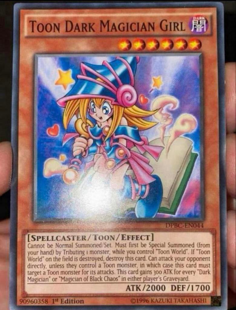 Yu-Gi-Oh! Toon Dark Magician Girl DPBC 1st Edition !, Hobby en Vrije tijd, Verzamelkaartspellen | Yu-gi-Oh!, Ophalen of Verzenden