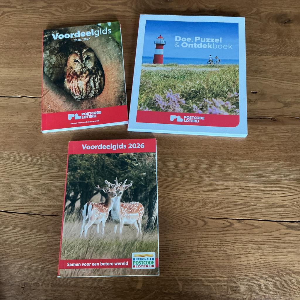 postcodeloterij voordeelgidsen en een puzzel en ontdekboek, Drie personen of meer, Ticket of Toegangskaart