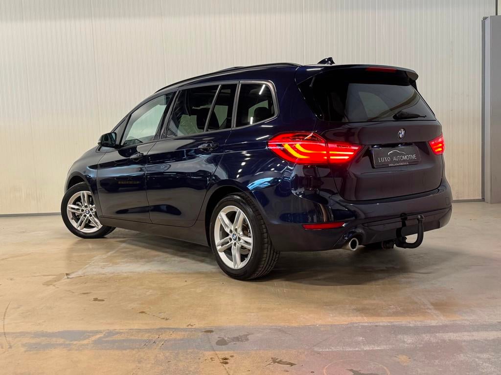 BMW 2-serie Gran Tourer 218i High Executive | PANO | TREKHAA, Auto's, Gebruikt, Euro 6, 2-Serie Gran Tourer, Blauw