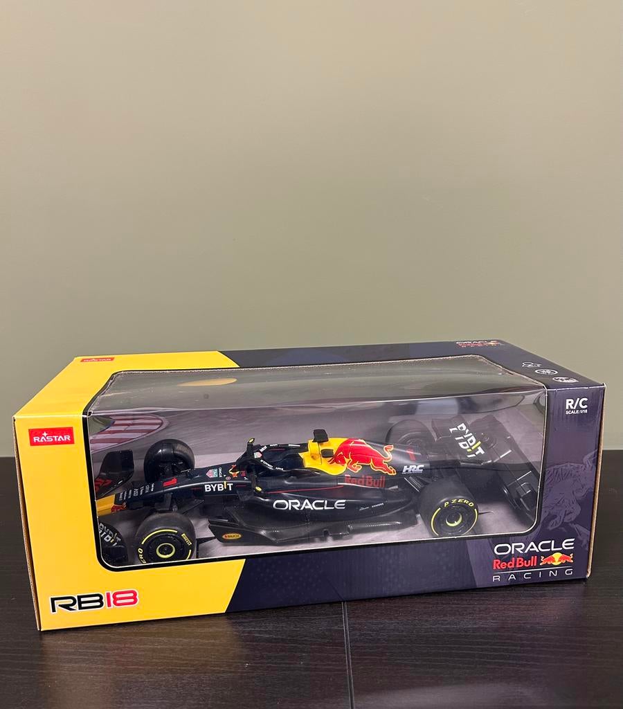 Bestuurbare raceauto redbull/ max verstappen, Ophalen of Verzenden, Zo goed als nieuw, Bburago