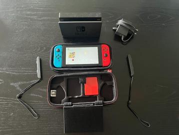 Nintendo Switch V2 | Rood-Blauw | Met Dock, Case + Optie voo beschikbaar voor biedingen