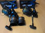 2 okuma 4000 baitrunner molens met reserve spoelen en lijn, Ophalen, Zo goed als nieuw, Molen