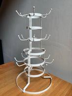 Mokkentoren voor 21 mokken, Ophalen