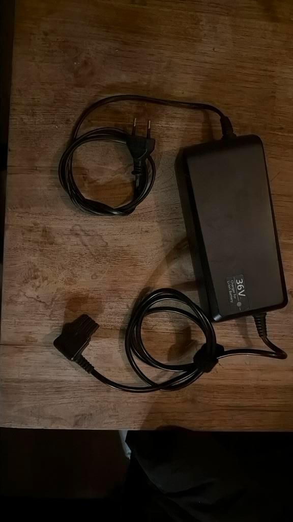 Panasonic acculader elektrische fiets gazelle, flyer, Fietsen en Brommers, Fietsonderdelen, Nieuw, Algemeen, Overige typen, Ophalen of Verzenden