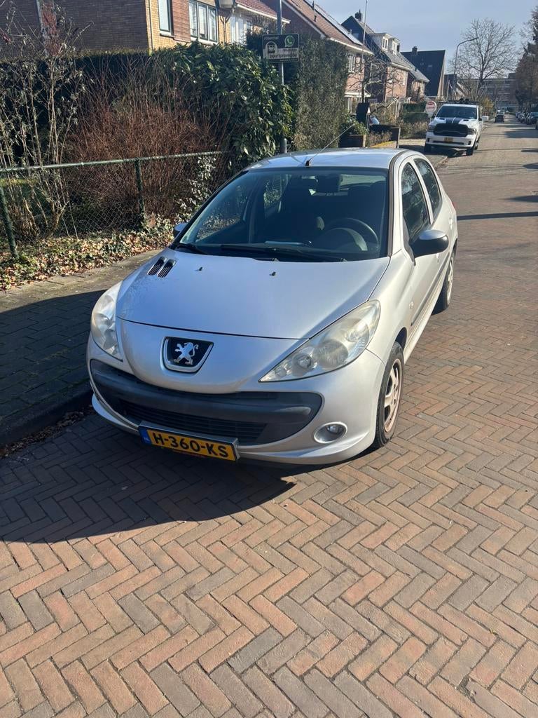 Peugeot 206 2010 Grijs, Voorwielaandrijving, Stof, 4 cilinders, Handgeschakeld