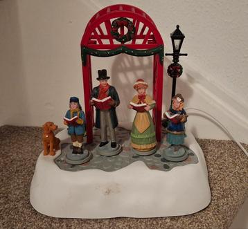 Zangkoor voor Kerstdorp.  beschikbaar voor biedingen