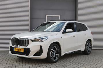 BMW iX1 eDrive20 67 kWh I Pano.dak I M Sportpakket I Camera  beschikbaar voor biedingen