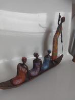 Afrikaanse Vrouwen in Boot Sculptuur, Ophalen