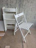 4 witte klapstoelen, Ophalen