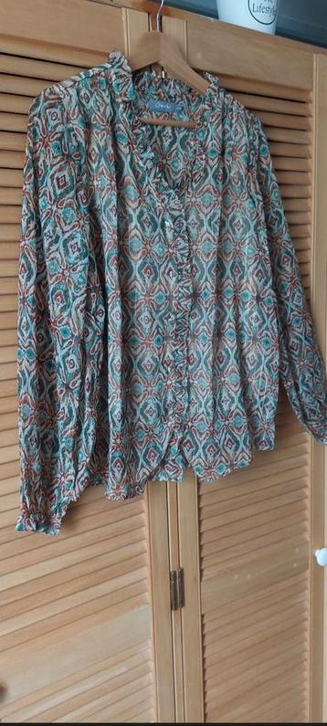 Geisha😊blouse met transparante mouw  maat l/40 beschikbaar voor biedingen