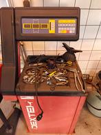 Professioneel balanceerapparaat voor auto's, Ophalen