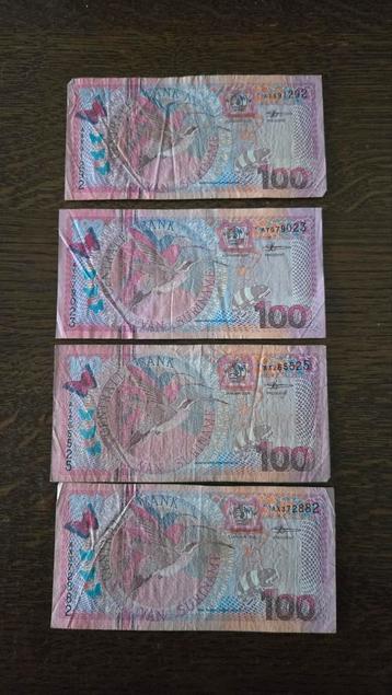 Suriname 4x 100 Gulden - Zie Foto beschikbaar voor biedingen